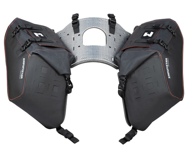 Black motorcycle side bags with a central mounting plate on a white background
